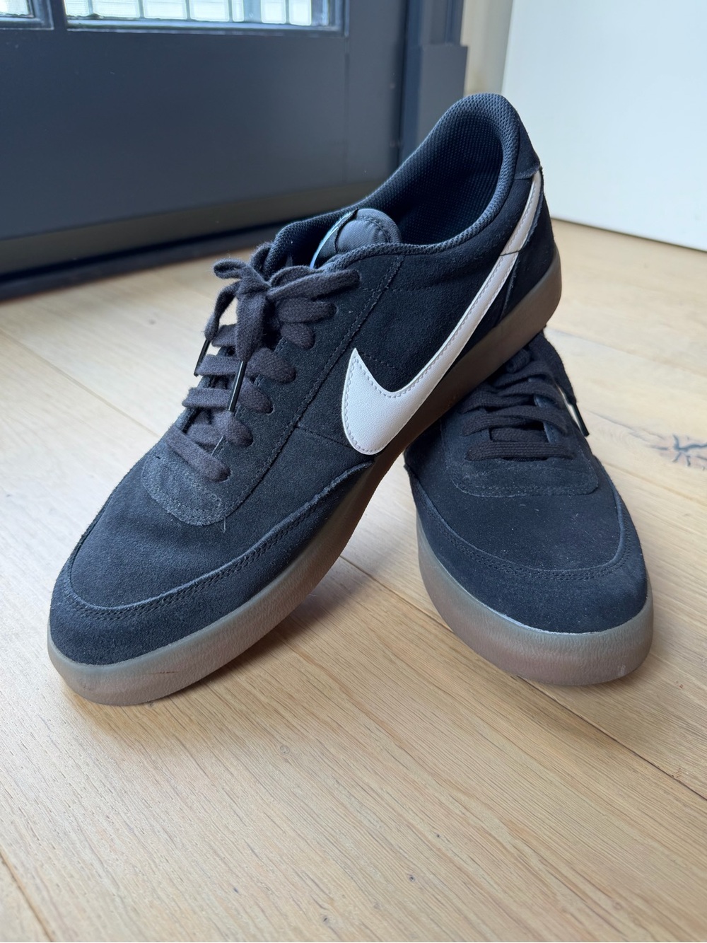 Nike Black Suede Sneakers with White Swoosh